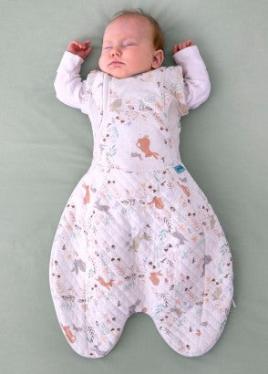 Baby sleeping wearing Purflo swaddle to sleep bag 2.5tog storybook print