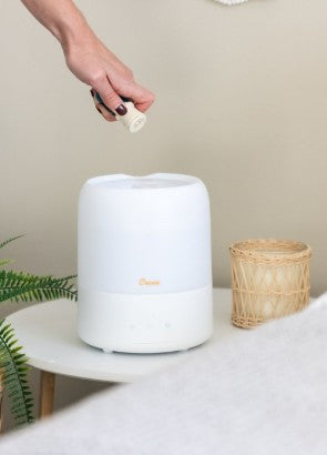 Essential oils dripping into crane 3 in 1 humidifier