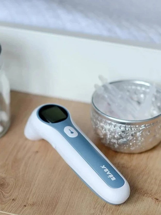 Beaba baby thermometer on table