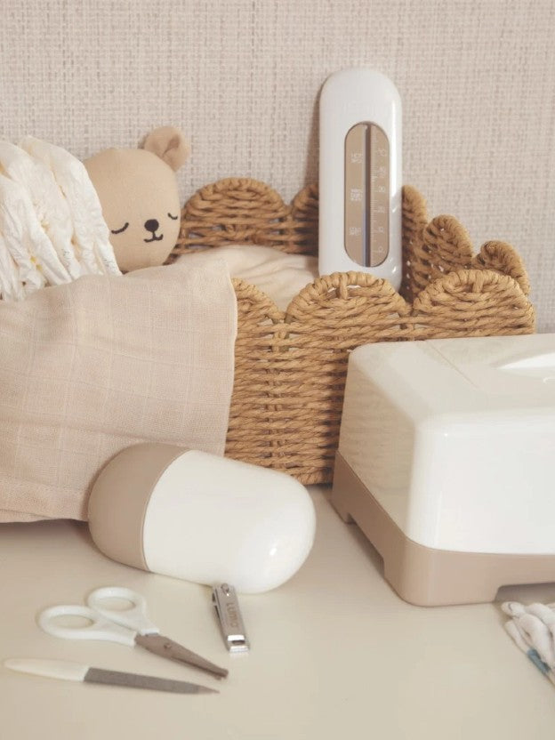 Bath accessories including thermometer and baby nail care kits