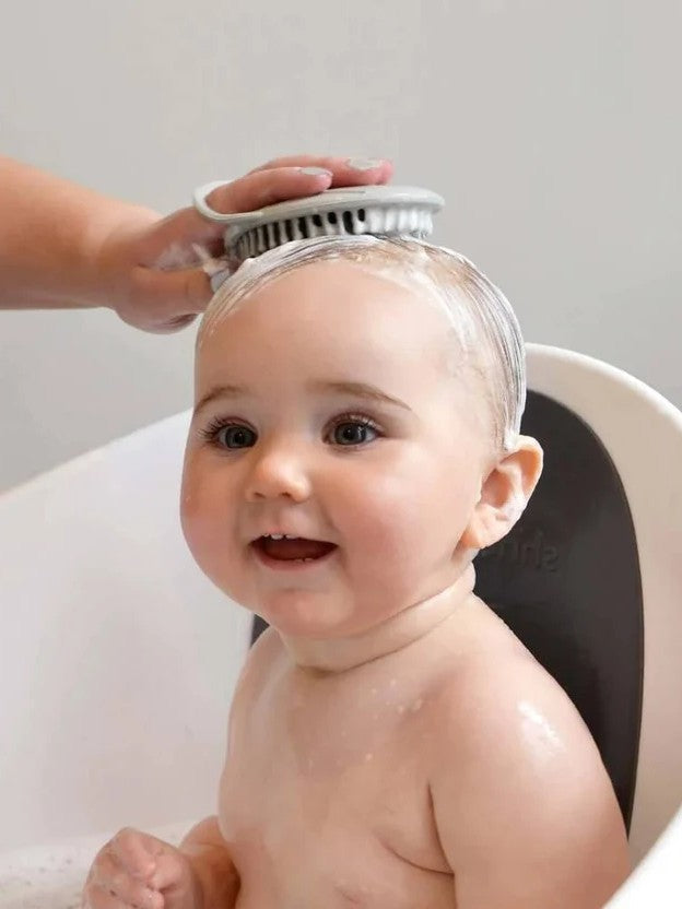 Girl carrying curly kidz hair shampoo