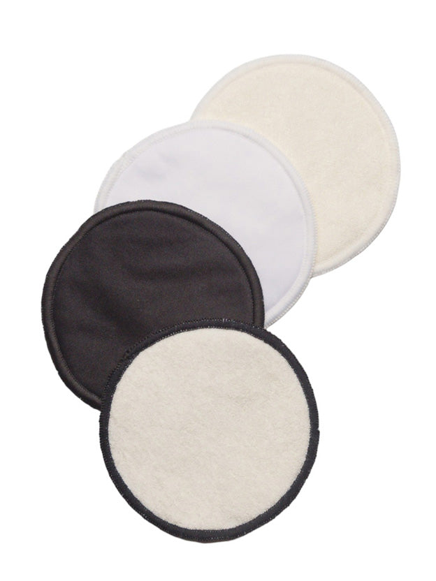 Set of four black and white reusable breast pads