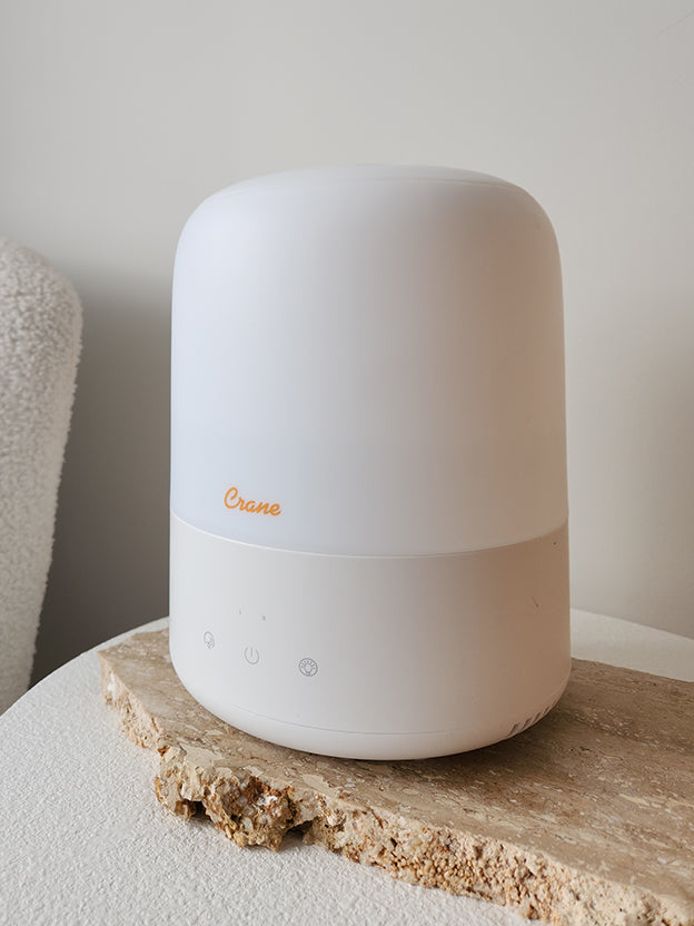 White Crane humidifier on a wooden tray