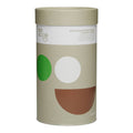 A cylindrical cardboard canister of Go Good New Zealand Whey Protein + Organic Vanilla flavor, featuring a minimalist beige design with a green and white circle and a brown semicircle on the front, set against a plain white background.