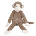 A brown Happy Horse monkey mickey soft toy on a white background. 