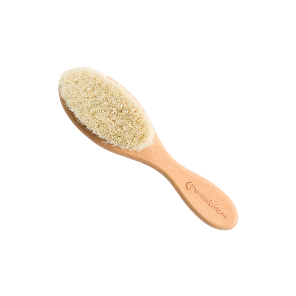 Sleep Store beechwood toddler hairbrush with natural bristles on white background