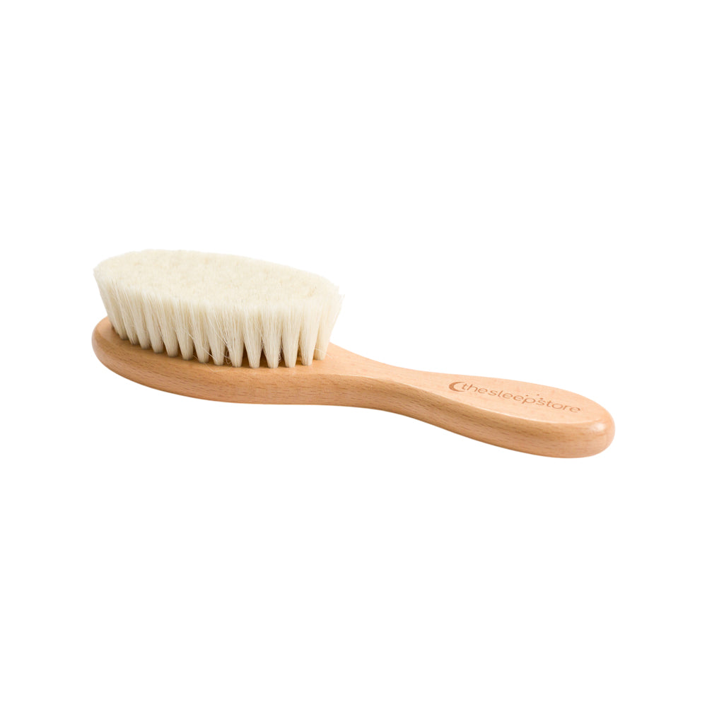 Sleep Store beechwood toddler hairbrush with natural bristles on white background