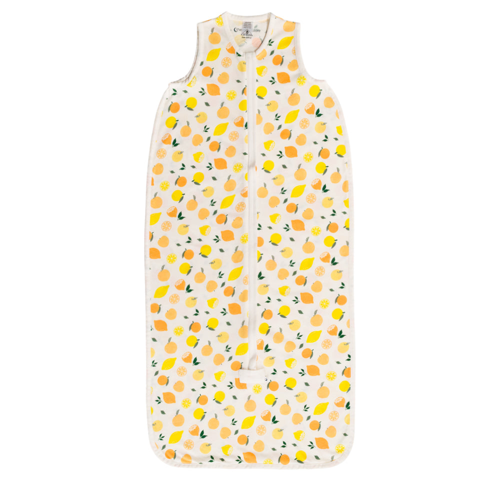Sleeveless sleeping bag with lemons and oranges on white, on a white background