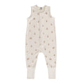 Cream Owl print baby sleep suit on a white background