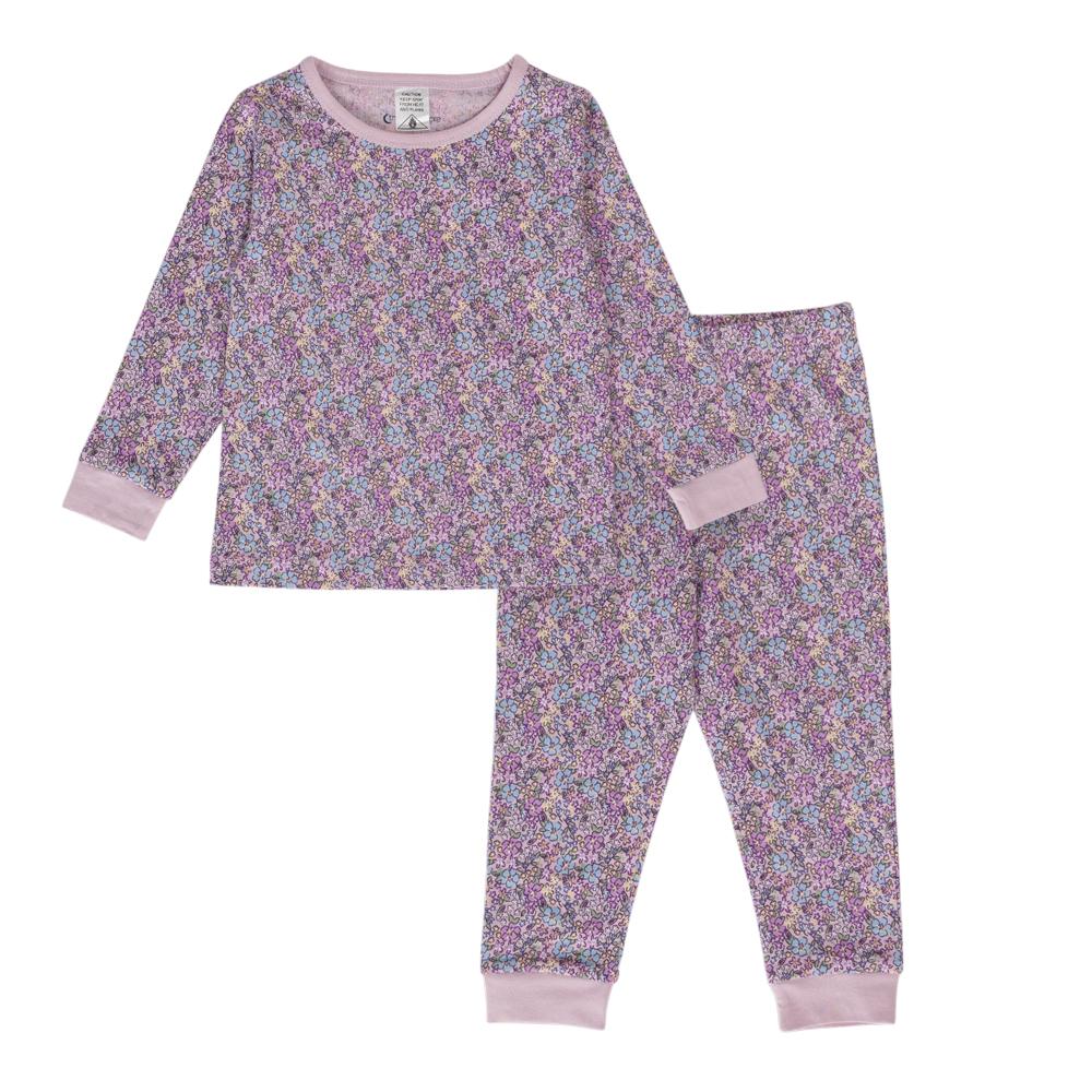 Cotton purple print pyjamas on a white background