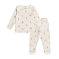 Cotton cream owl print pyjamas on a white background
