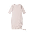 Cream baby merino gown on white background