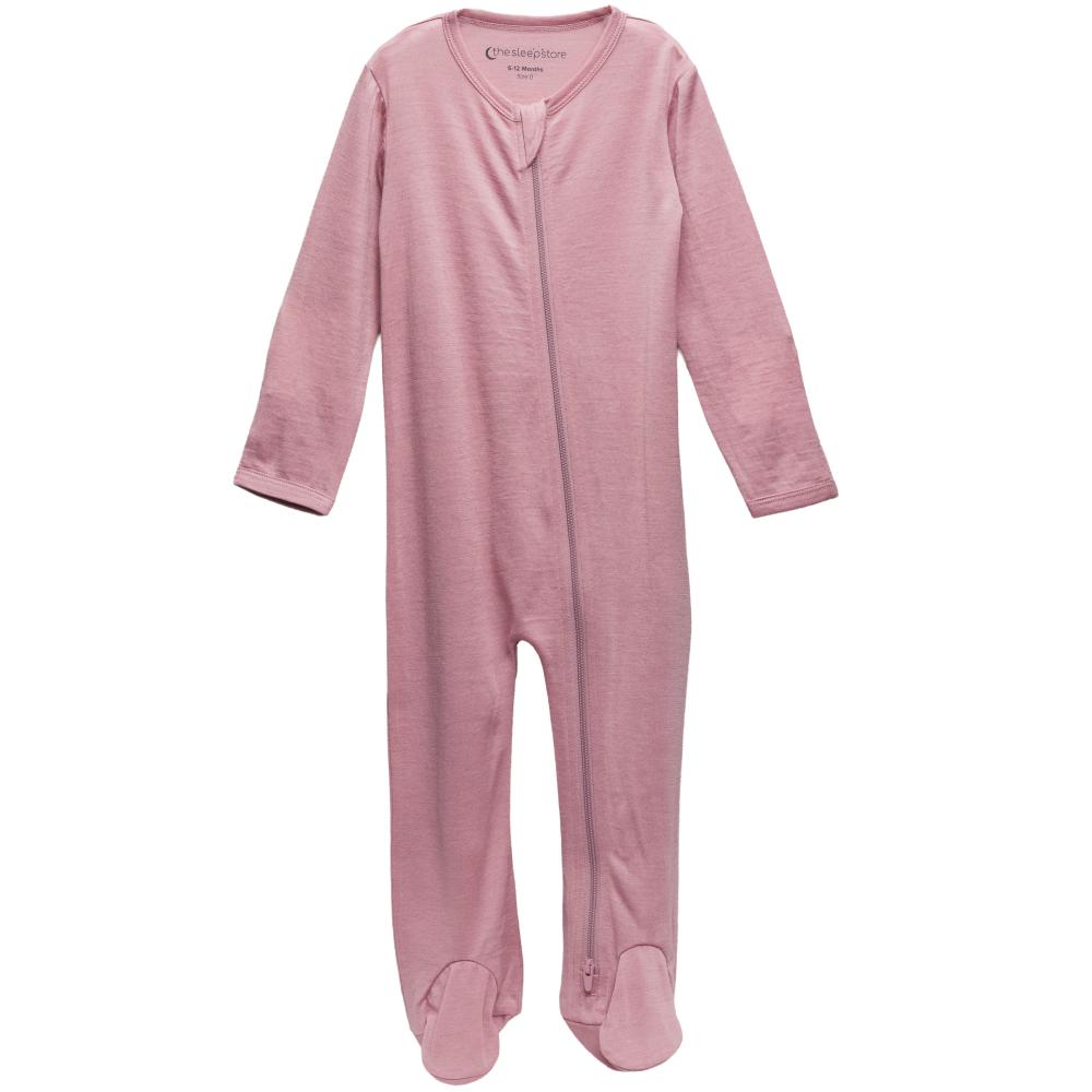Pink footed merino zipsuit on a white background