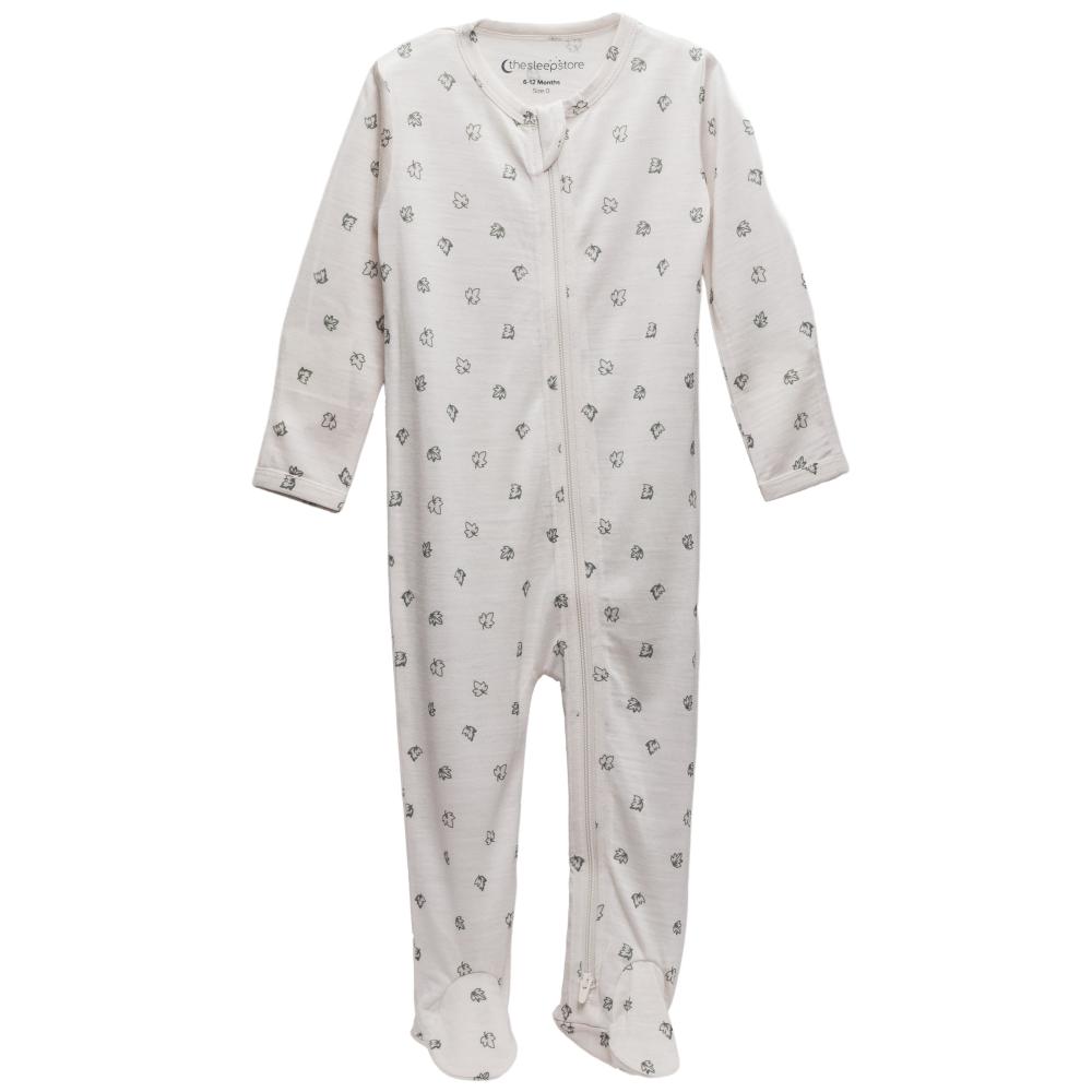 Cream with leaves footed merino zipsuit on a white background
