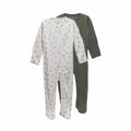 2 footed merino zipsuits, one green, one cream with leaves on a white background