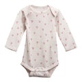 Cream with hearts print merino long sleeve bodysuit on a white background