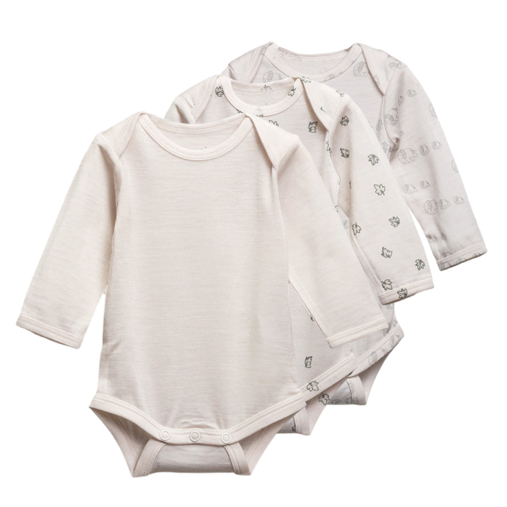 3 pack of long sleeve merino bodysuits in cream and 2 prints on a white background