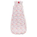 A sleeveless cotton baby sleep sack with a repeating floral pattern in pink, purple, and orange on a white background, shown flat against a white background.