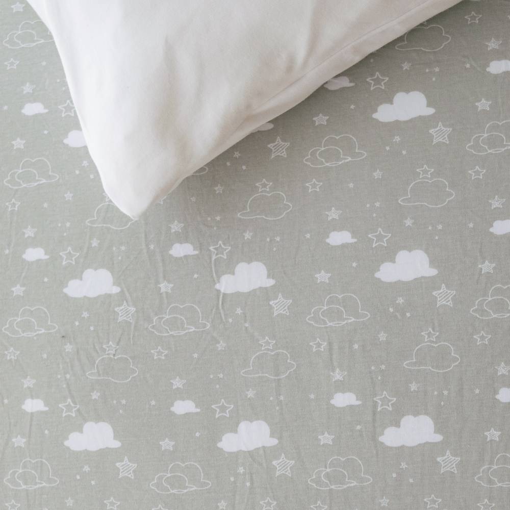 Cloud patterned fitted sheet on white background