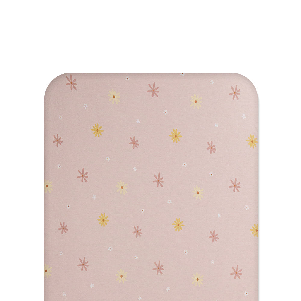 Floral patterned fitted sheet on white background
