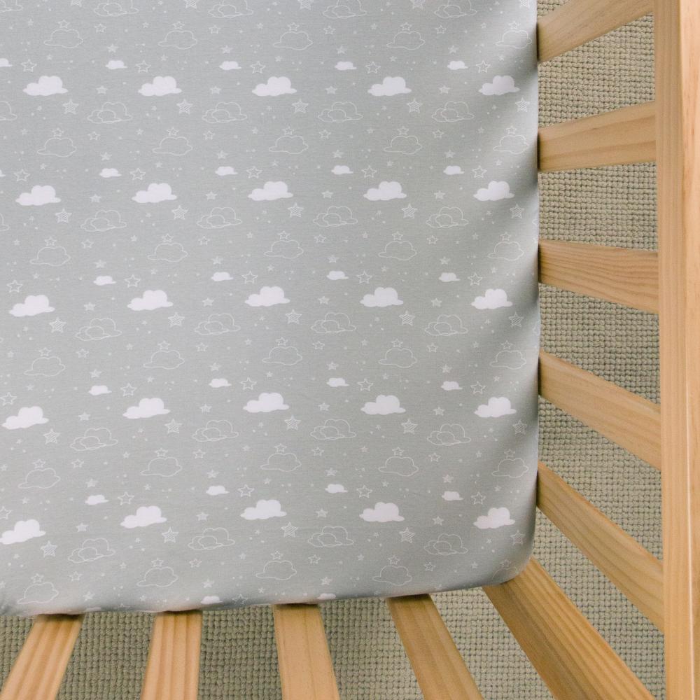 Cloud patterned fitted sheet on white background