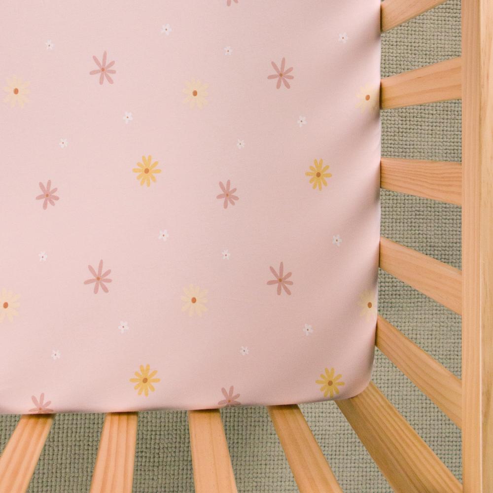 Floral patterned fitted sheet on white background