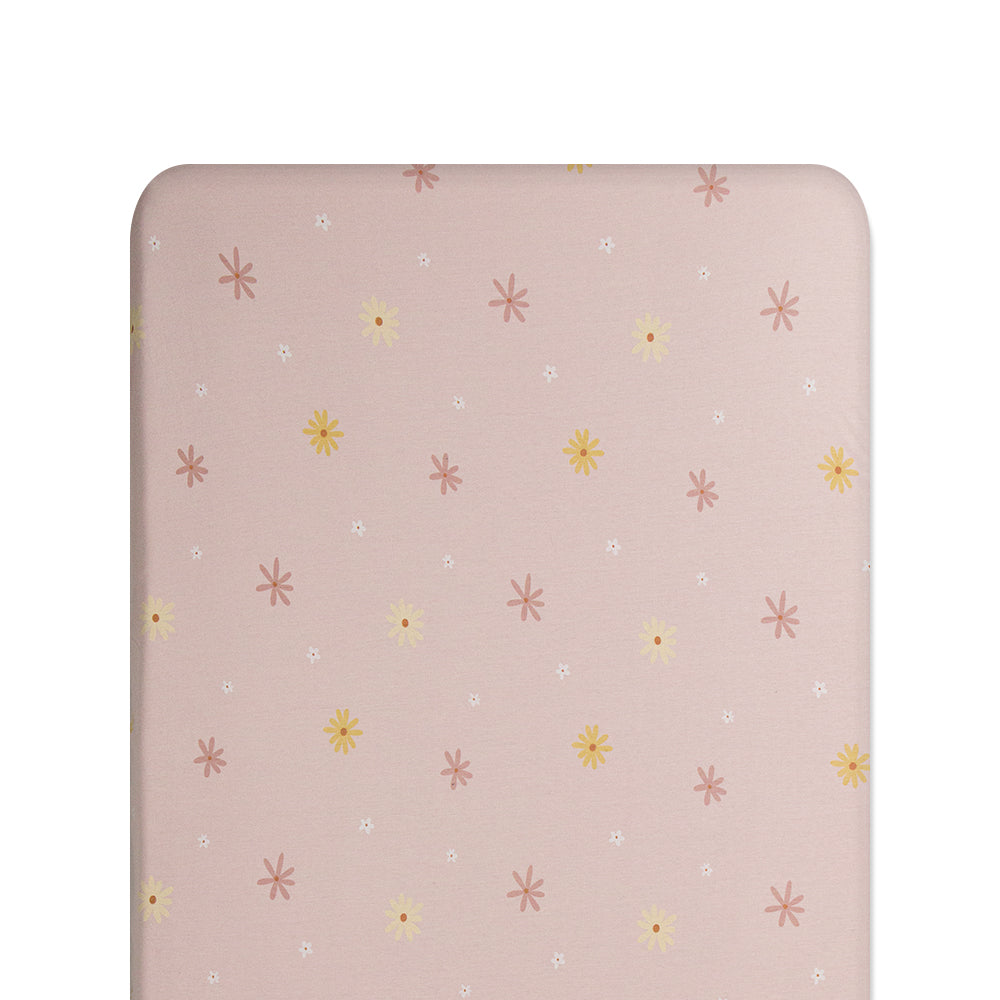 Floral patterned fitted sheet on white background