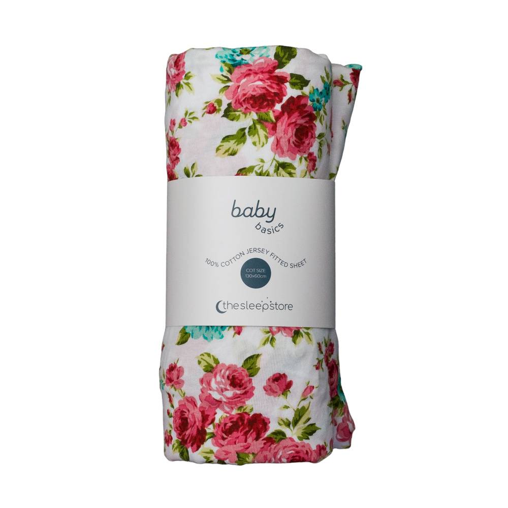 Pink Floral fitted sheet on white background