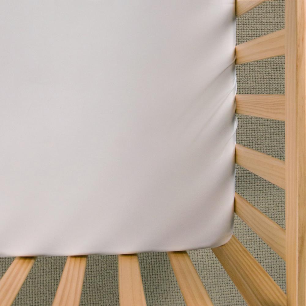 White fitted sheet on white background