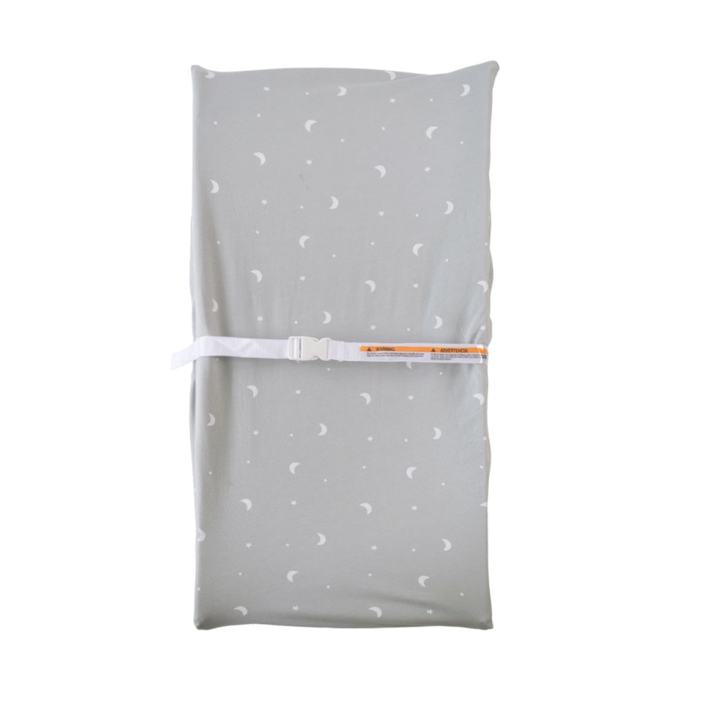 Grey baby change pad cover with small star print on a light gray background