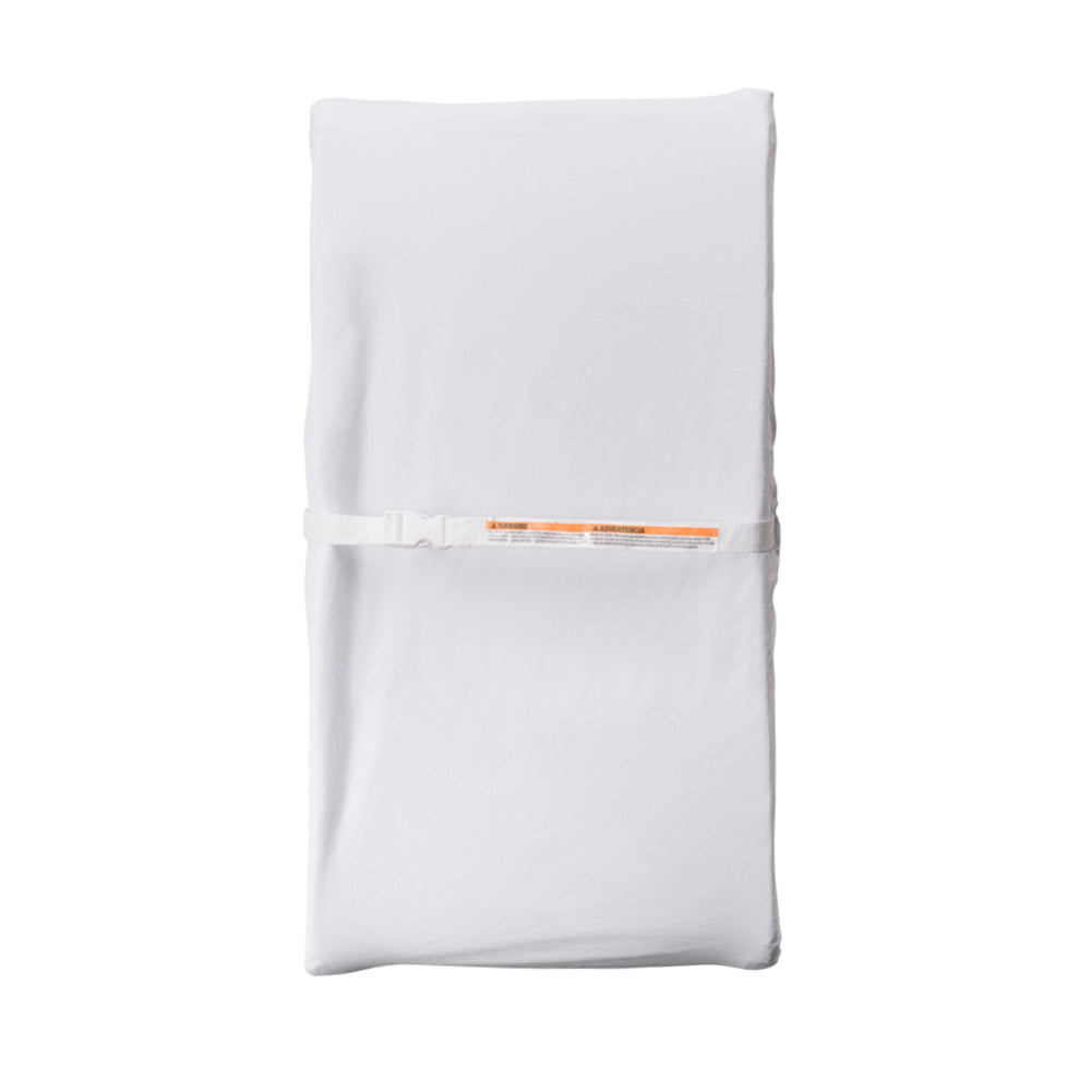 White change mat cover on a change pad on a white background. 