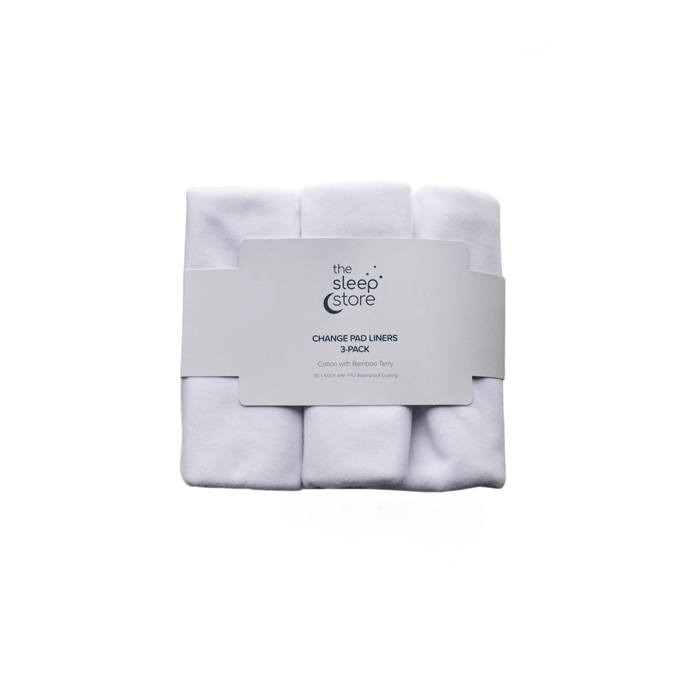 Pack of three change pad liners with a label on a white background