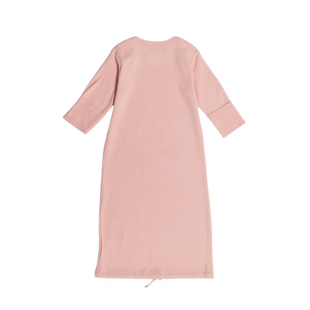 Pink organic cotton night gown with long sleeves on a white background