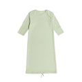 Light green cotton baby gown with envelope neck on a white background