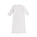 White cotton baby gown on a white background