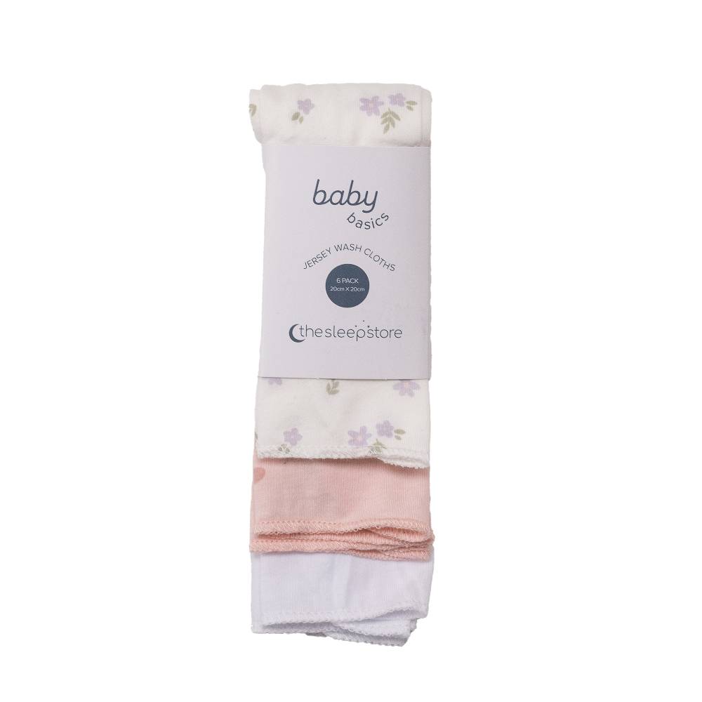 Pack of baby washcloths with floral patterns on a white background