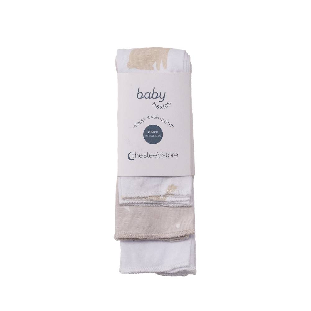 Pack of baby washcloths with 'baby basics' label on a white background