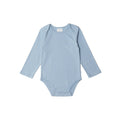 Light blue organic cotton baby bodysuit with long sleeves on a white background