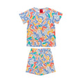 A two-piece kids' pyjama set featuring a short-sleeve t-shirt and matching shorts with an all-over abstract multicolor graffiti-style pattern on a white background.