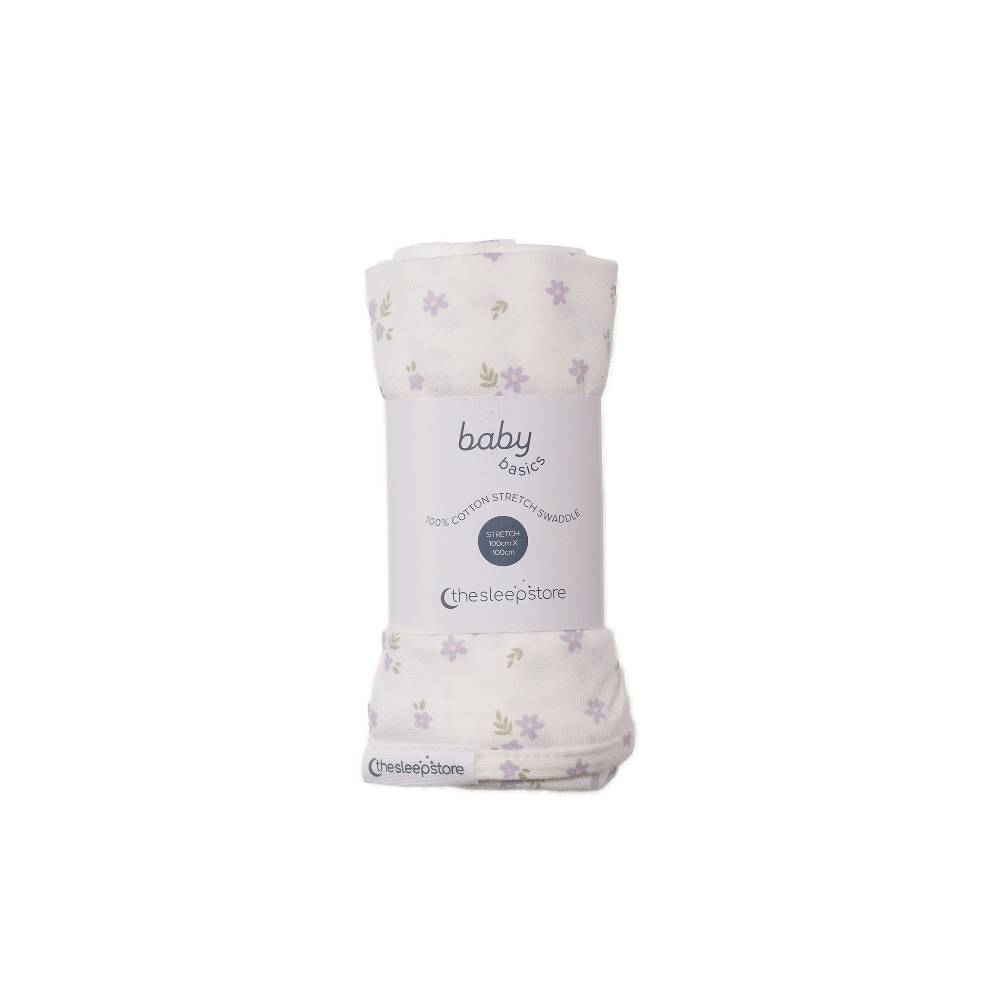 Baby swaddle blanket with floral pattern and 'the sleep store' branding on a white background