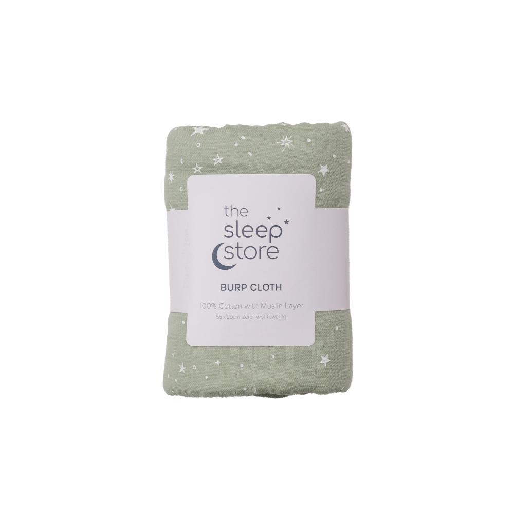 Green burp cloth with star pattern and 'The Sleep Store' label on a white background