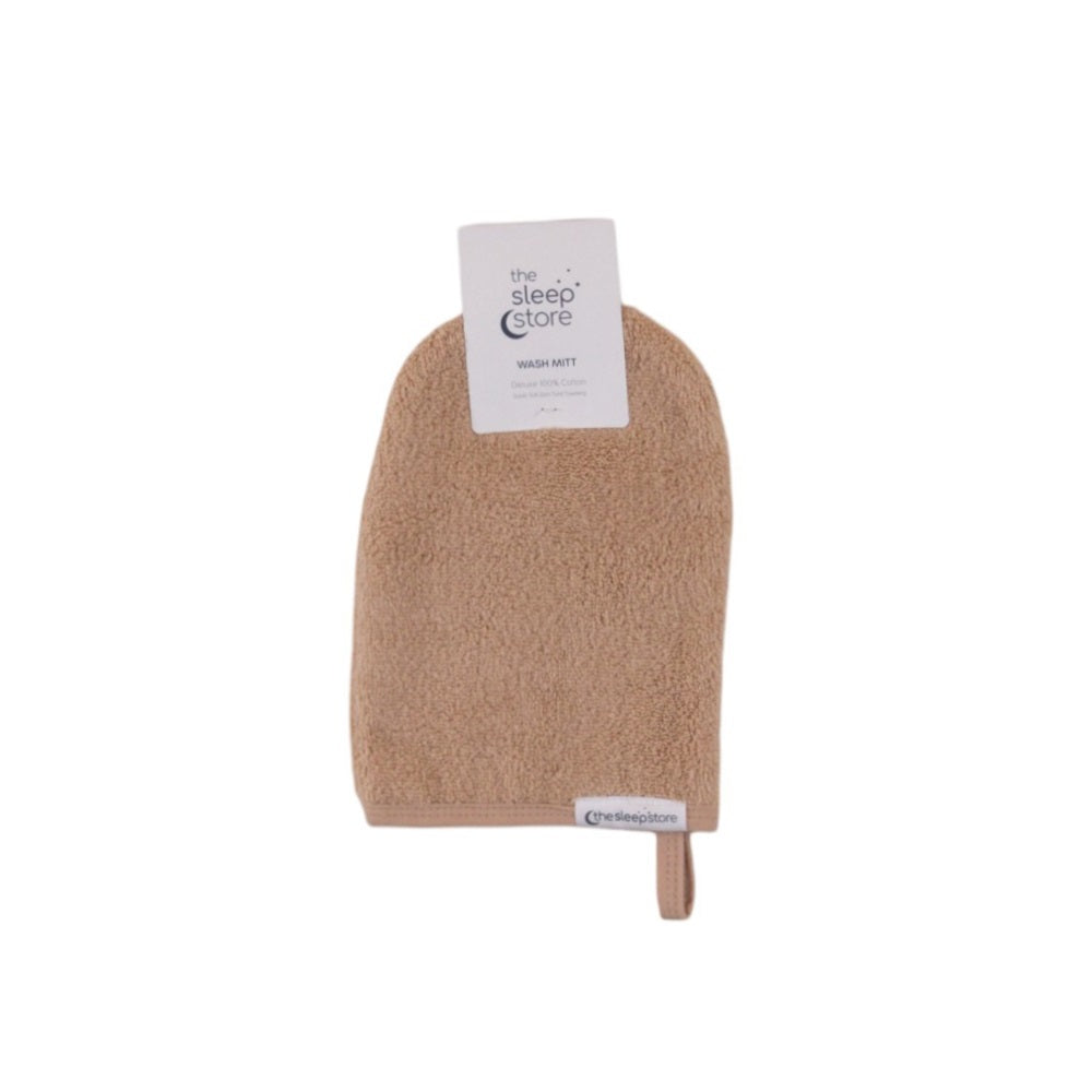 Oat bath mitt with a label on a white background