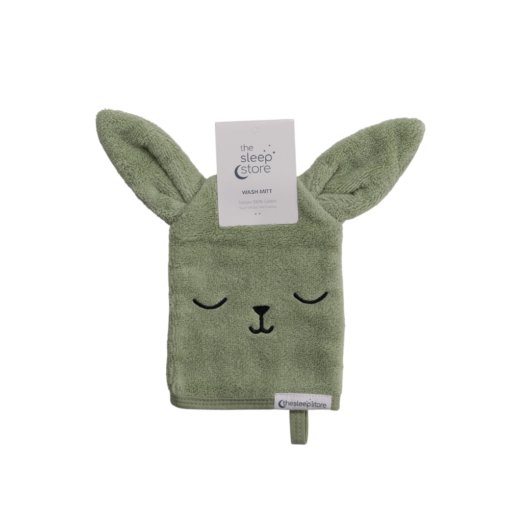 Green rabbit-shaped wash mitt with a visible brand label on a white background