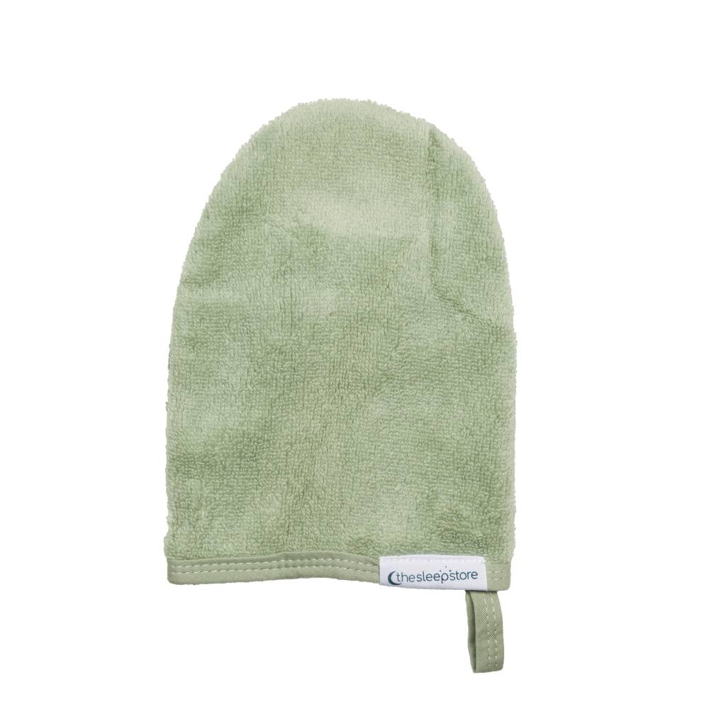 Green washcleaning mitt on a white background