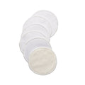 Six reusable bamboo breast pads  fanned out on a plain white background, with the front pad showing a soft off-white textured side and the remaining pads showing a white side.