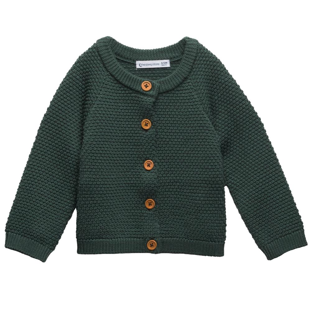 Forest green merino wool knitted cardigan with brown buttons on a white background