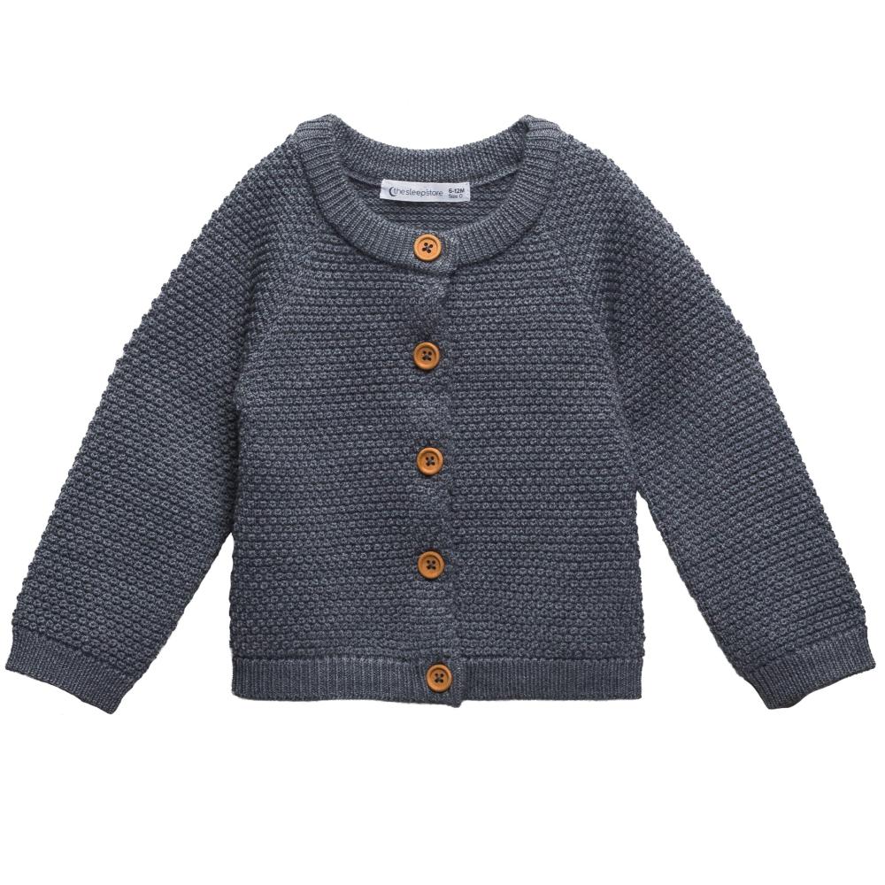 Grey merino wool seed stitch knitted cardigan with brown buttons on a white background