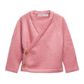 Pink merino wool baby kimono cardigan with brown buttons on a white background