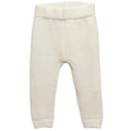 Cream merino wool knitted baby pants on a white background