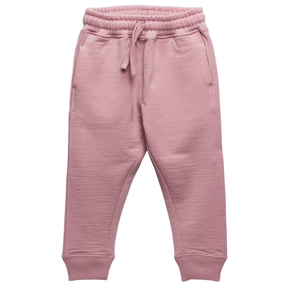 A pair of dusty pink children's merino fleece sweatpants with an elastic waistband, drawstring, and ribbed ankle cuffs, shown against a plain white background.